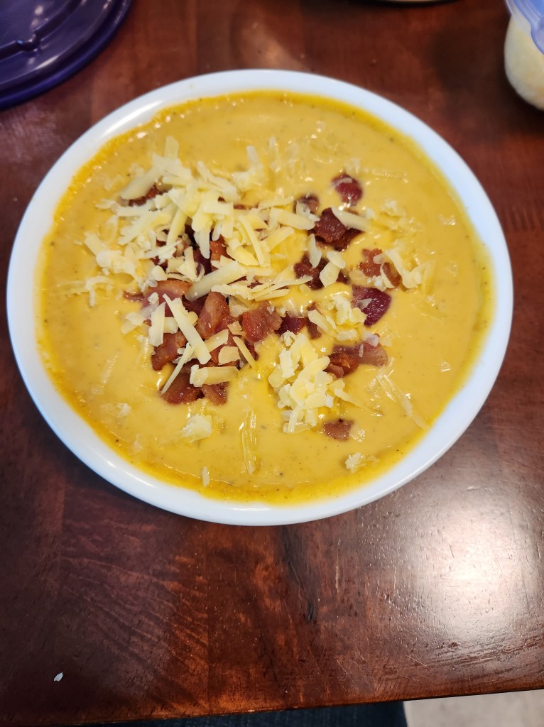 The best roasted butternut squash soup topped with crispy bacon annd cheese you'll ever taste.