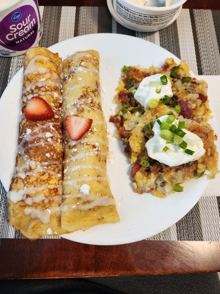 Gluten free crepes stuffed with lemon ricotta filling and two potato leek pancakes.